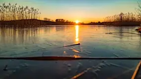 Zachód słońca nad grodziskiem Święta Góra i jeziorem Wojnowo, luty 2022 r. - zdjęcie 25