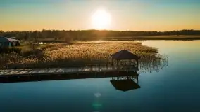 Zachód słońca nad Piszem i jeziorem Roś z drona - zdjęcie 1