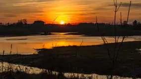 Mazurski zachód słońca odbity w rozlewiskach, luty 2024 r. - zdjęcie 16