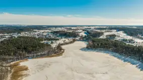 Jezioro Jędzelewo i Stare Juchy z lotu ptaka w zimowej scenerii, luty 2026 r. - zdjęcie 17