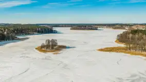 Jezioro Jędzelewo i Stare Juchy z lotu ptaka w zimowej scenerii, luty 2026 r. - zdjęcie 14