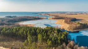 Jeziora Niegocin, Niałk Duży i Mały oraz Wojnowo u progu wiosny, z lotu ptaka - zdjęcie 20