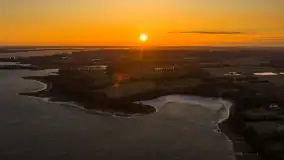 Zachód słońca nad wsią i jeziorem Stręgiel, marzec 2026 r. - zdjęcie 1