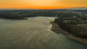 Zachód słońca nad wsią i jeziorem Stręgiel, marzec 2026 r. - zdjęcie 26