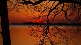 Marcowy zachód słońca nad jeziorem Dargin, Nowy Harsz - zdjęcie 1