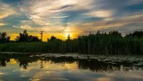 Zachód słońca, widok z wody na jezioro Święcajty - zdjęcie 7