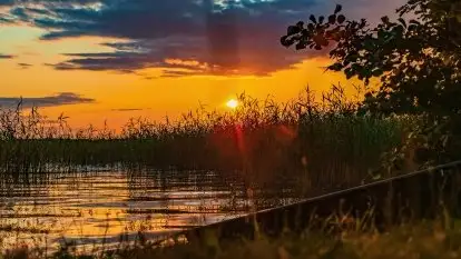 Zachód słońca nad jeziorem Dejguny, lipiec 2021 r.