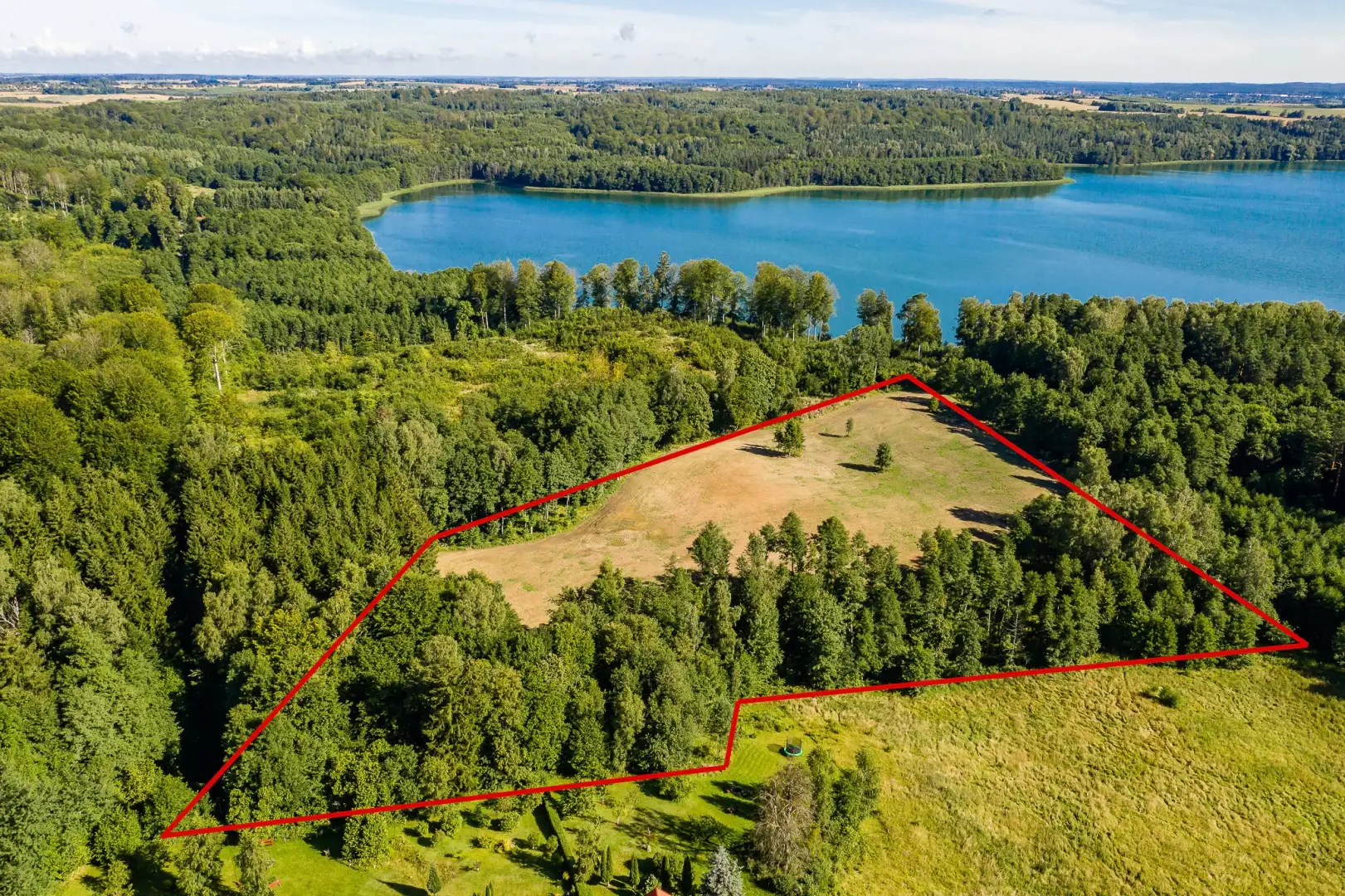 piekna  3 hektarowa dzialka nad jeziorem Limajno z warunkami zabudowy